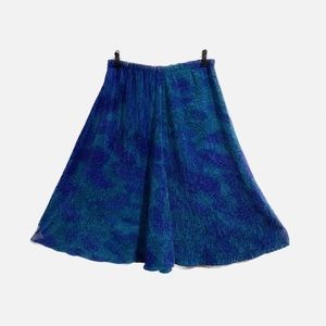 Jewel tone stretch a-line skirt. Save 25% when you buy two or more.